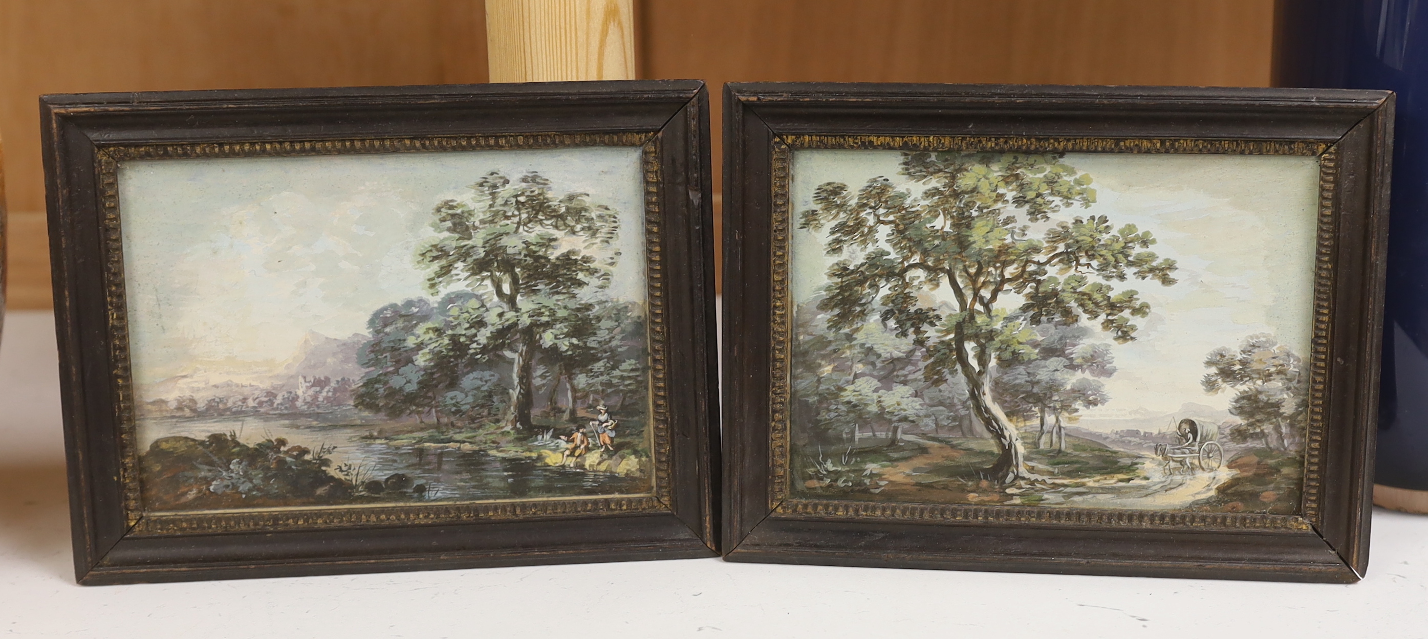 19th century School, pair of gouaches, Anglers beside a river and horse & cart on a pathway, each with ink inscriptions verso, 9.5 x 14cm, housed in ebonised frames